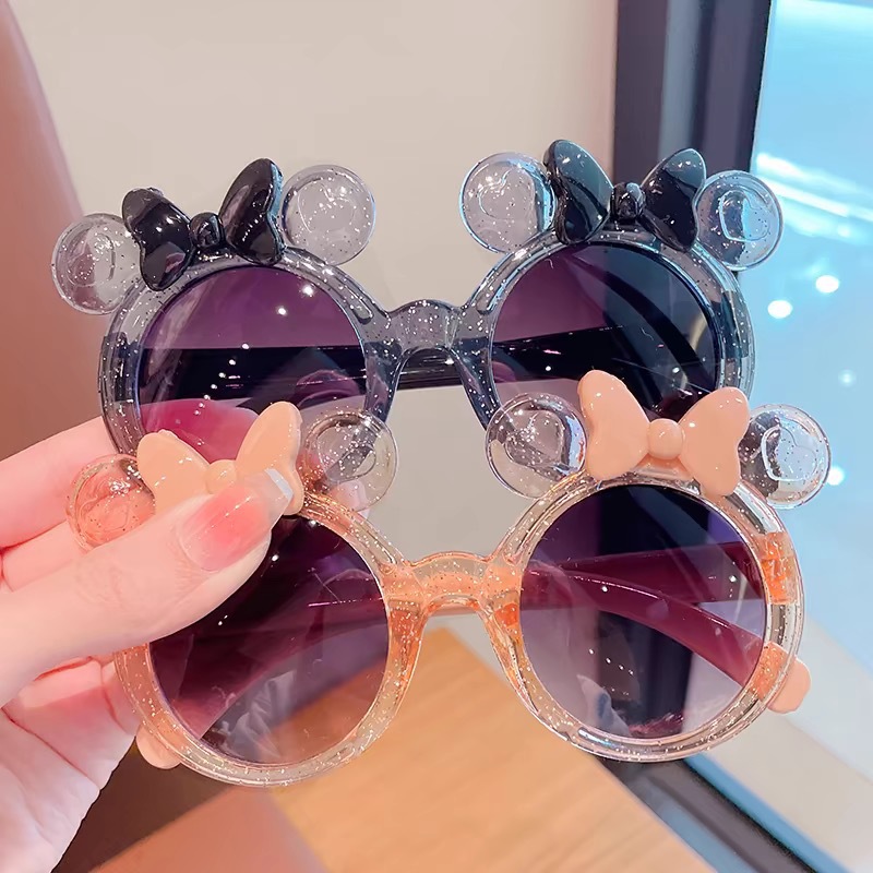 Kính râm trẻ em RG1743 UV400, dáng tròn nơ tai gấu, gọng nhẹ - Kính râm trẻ em nơ tai gấu chống nắng UV400, kính mát bé gái phong cách dễ thương, kính chụp ảnh đi chơi cho bé