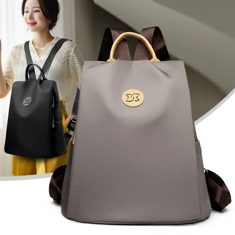 Ba lô nữ chống trộm 2026 RG1733, kiểu mới dành cho đi làm, đi học, chất liệu dày dặn, sức chứa lớn, có ngăn đựng laptop.